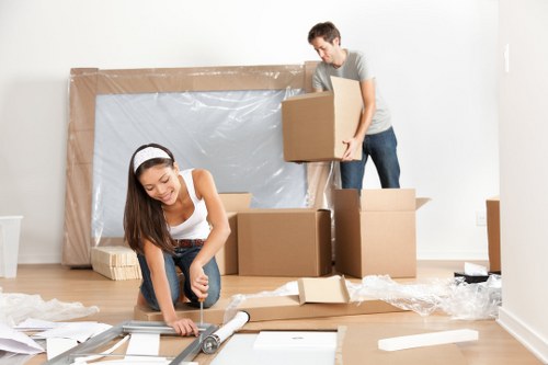 Packing office furniture and equipment for a local business move