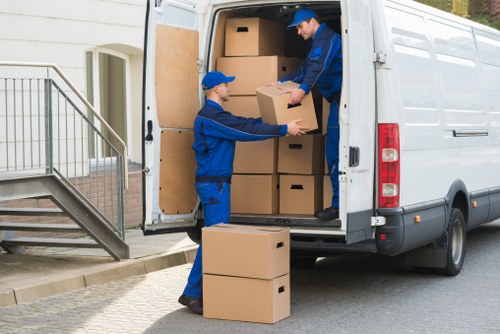 Man And A Van Tufnell Park team sorting recyclable items during a local move
