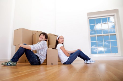 Removal van loading furniture for a move in North London